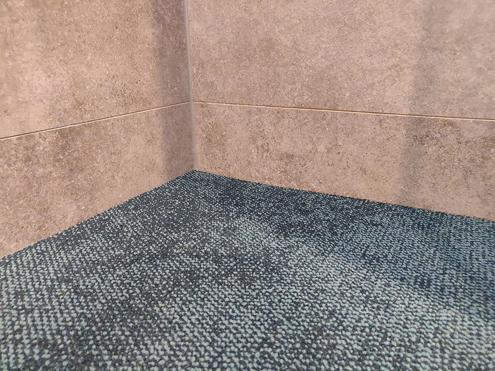 tapijttegels douche sparo